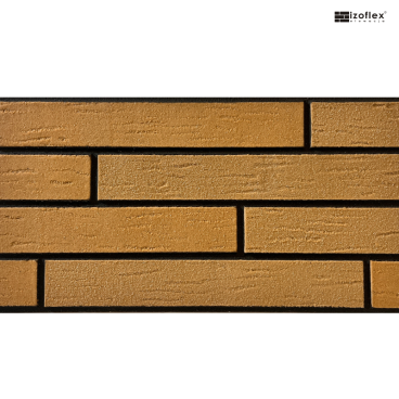 IO38 – długie płytki w piaskowym kolorze rustykalna faktura i czarna fuga